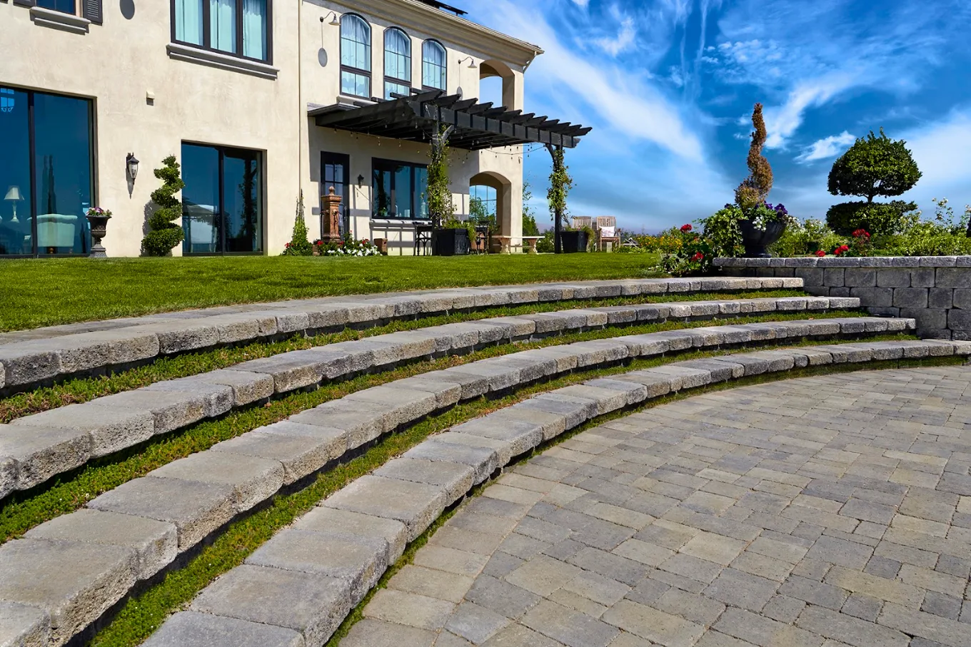 A stone retaining wall turning a slope into usable space