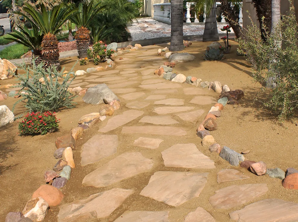 Flagstone walk and rock-edged garden in Encinitas